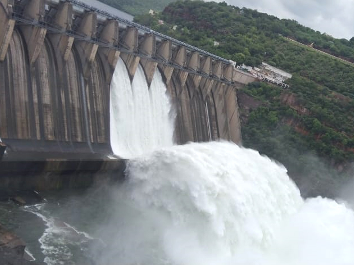 Srisailam Dam Gates Opened - Sakshi10