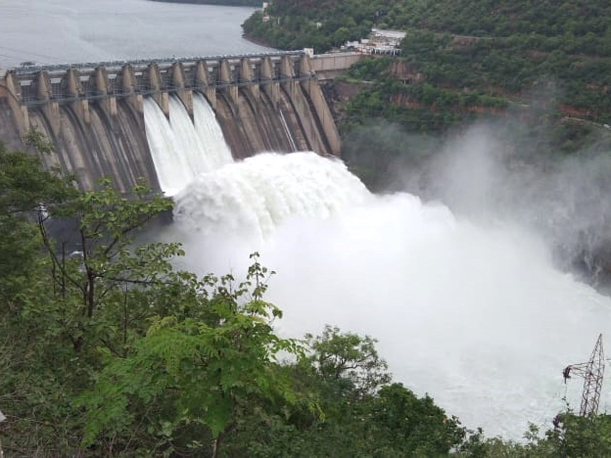 Srisailam Dam Gates Opened - Sakshi11