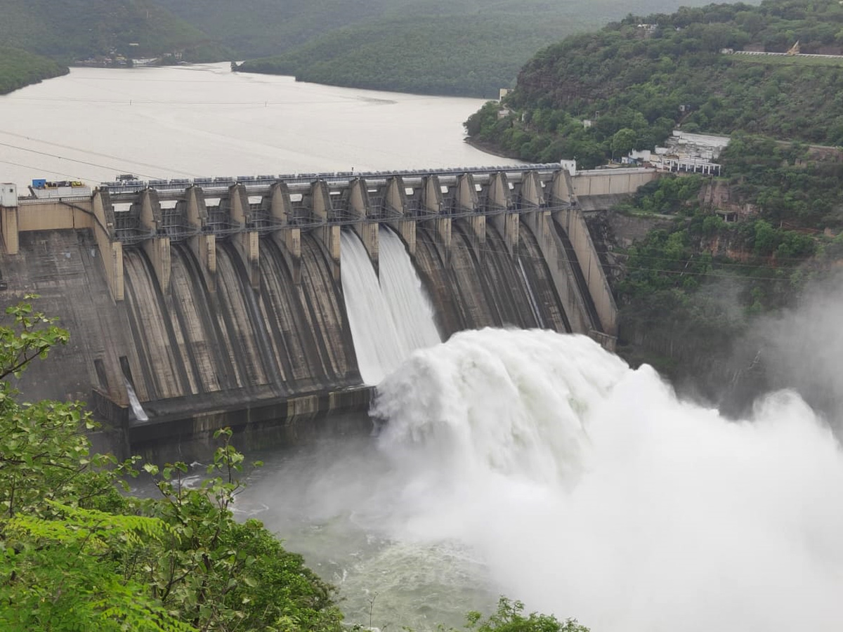 Srisailam Dam Gates Opened - Sakshi12