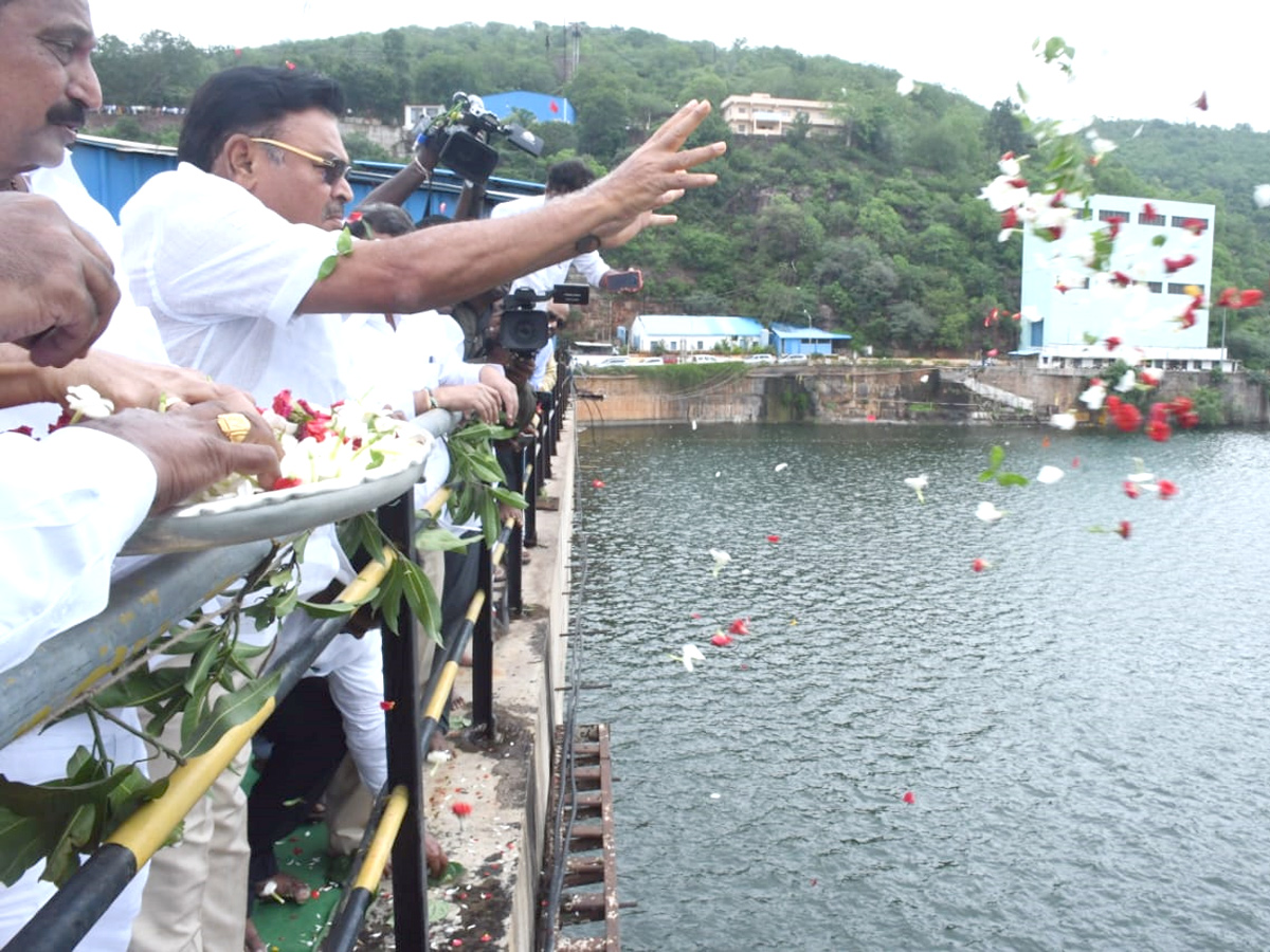 Srisailam Dam Gates Opened - Sakshi3