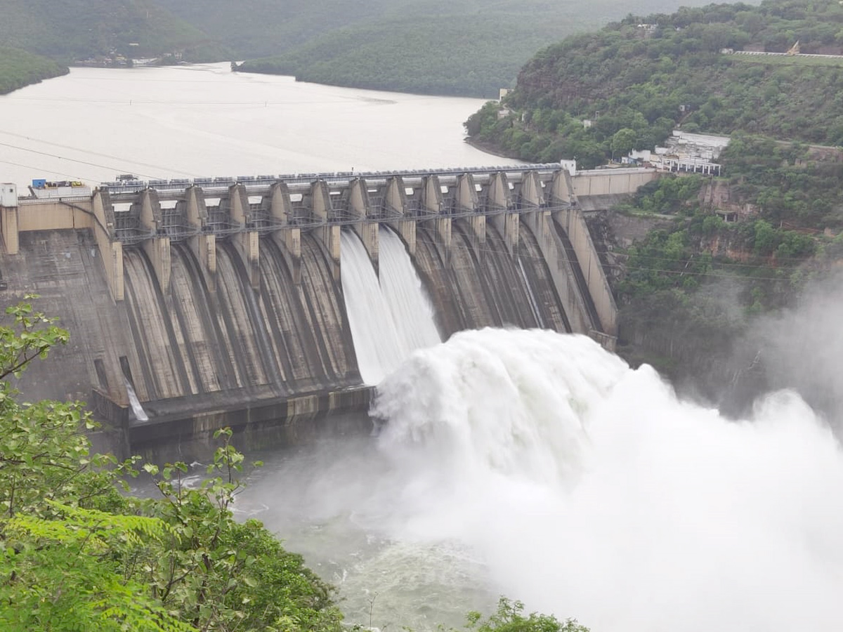 Srisailam Dam Gates Opened - Sakshi4