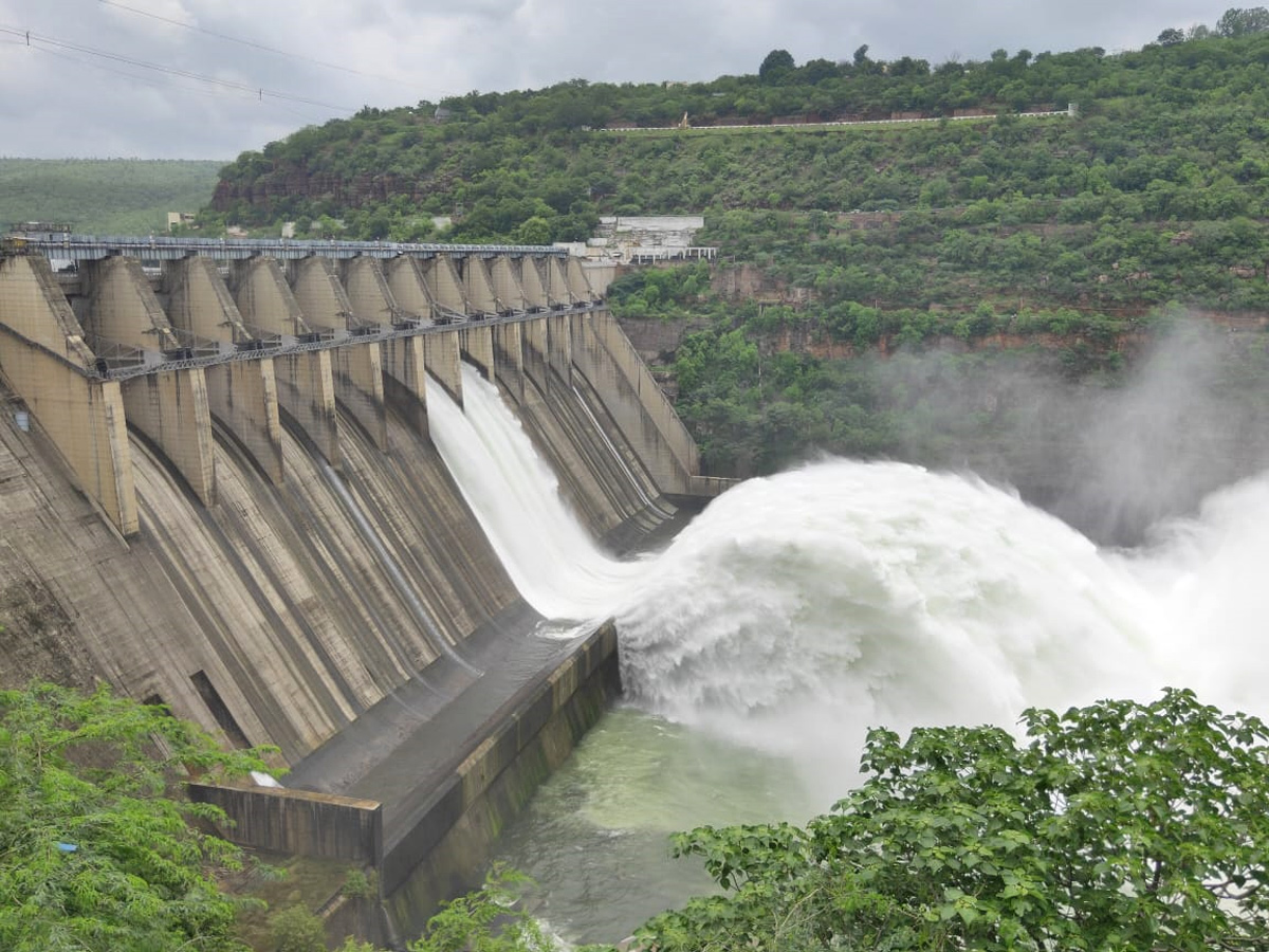 Srisailam Dam Gates Opened - Sakshi6