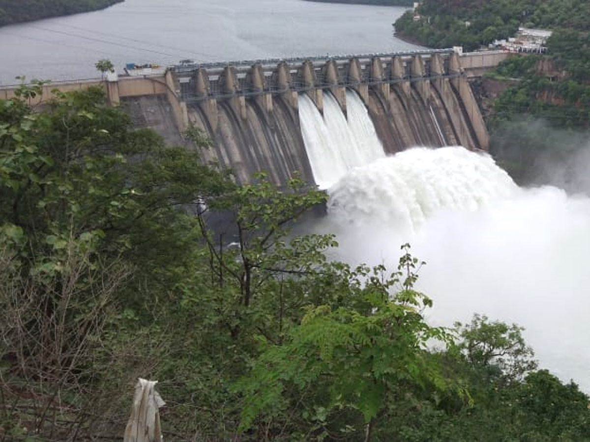 Srisailam Dam Gates Opened - Sakshi7