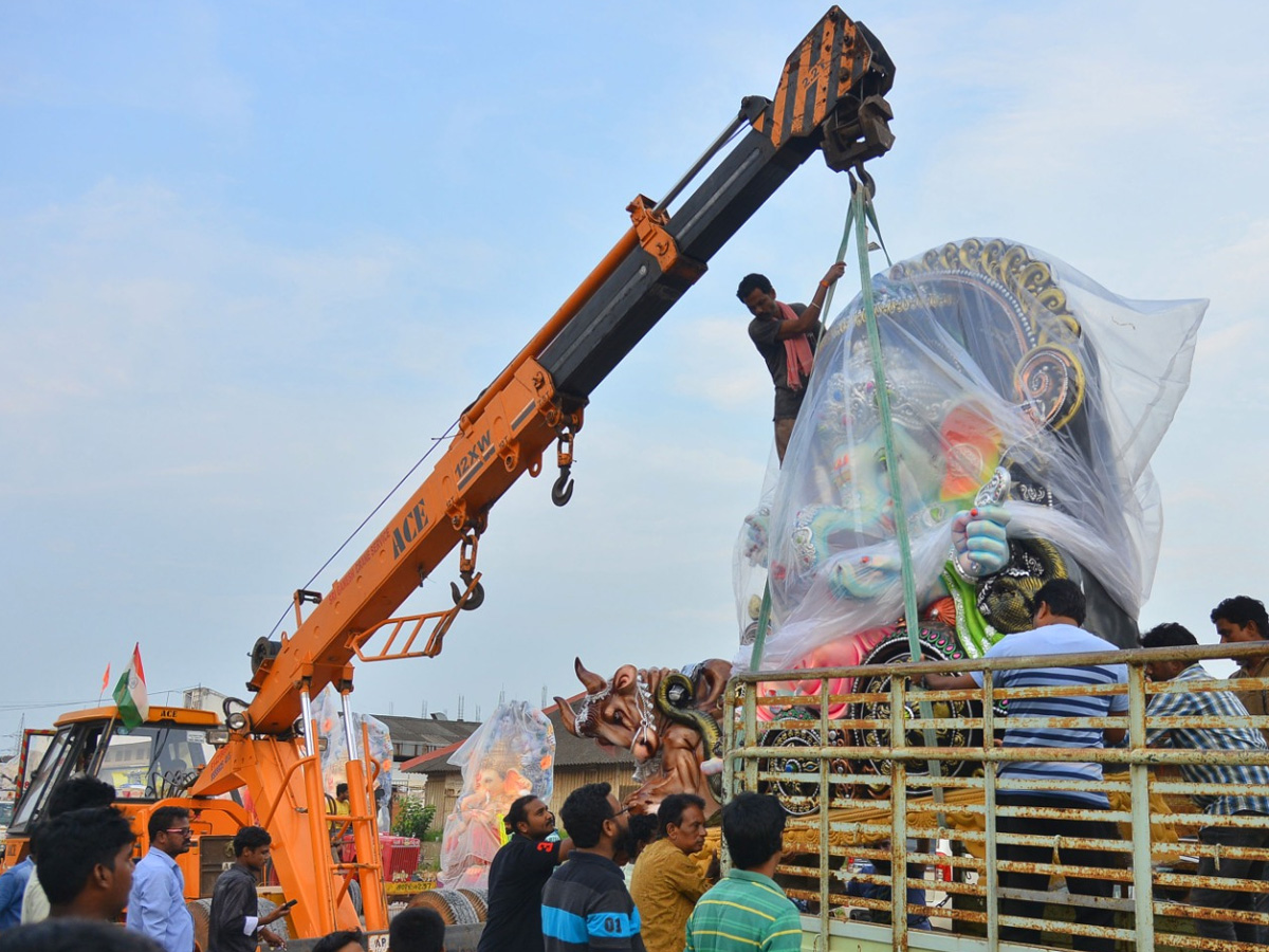 People carry idols of Ganesha on a truck ahead of Ganesh Chaturti festival Photo Gallery - Sakshi5