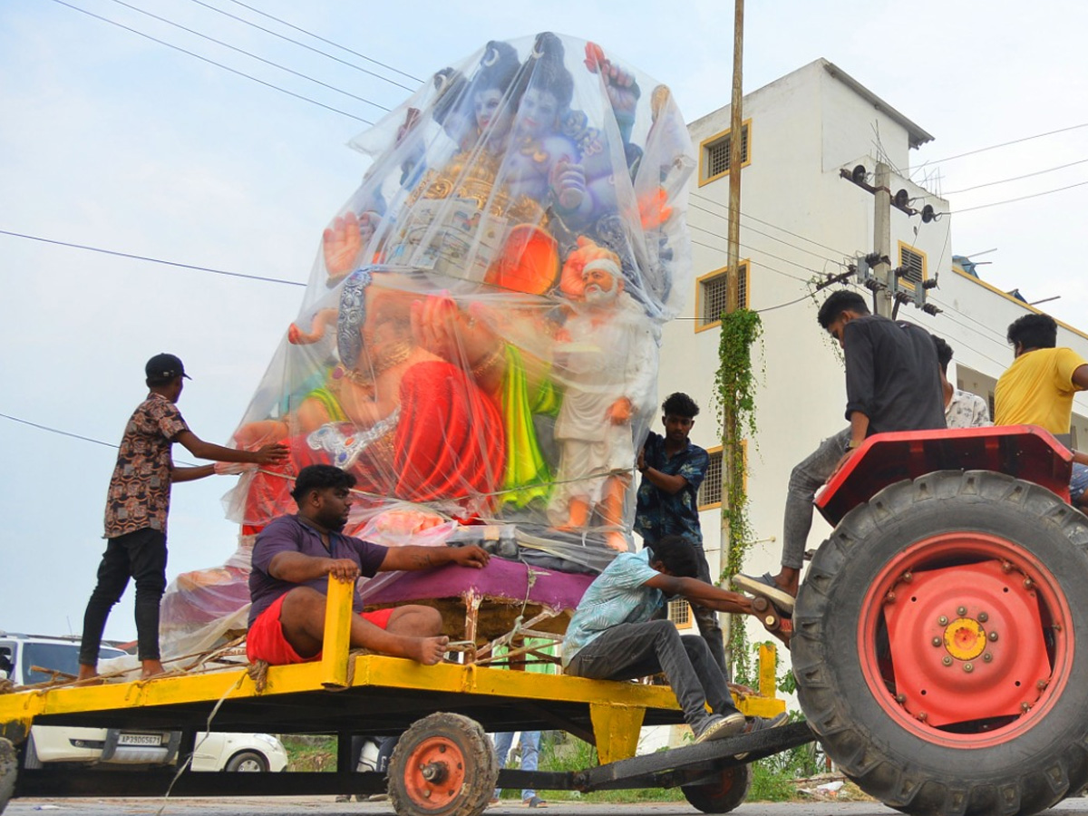 People carry idols of Ganesha on a truck ahead of Ganesh Chaturti festival Photo Gallery - Sakshi14