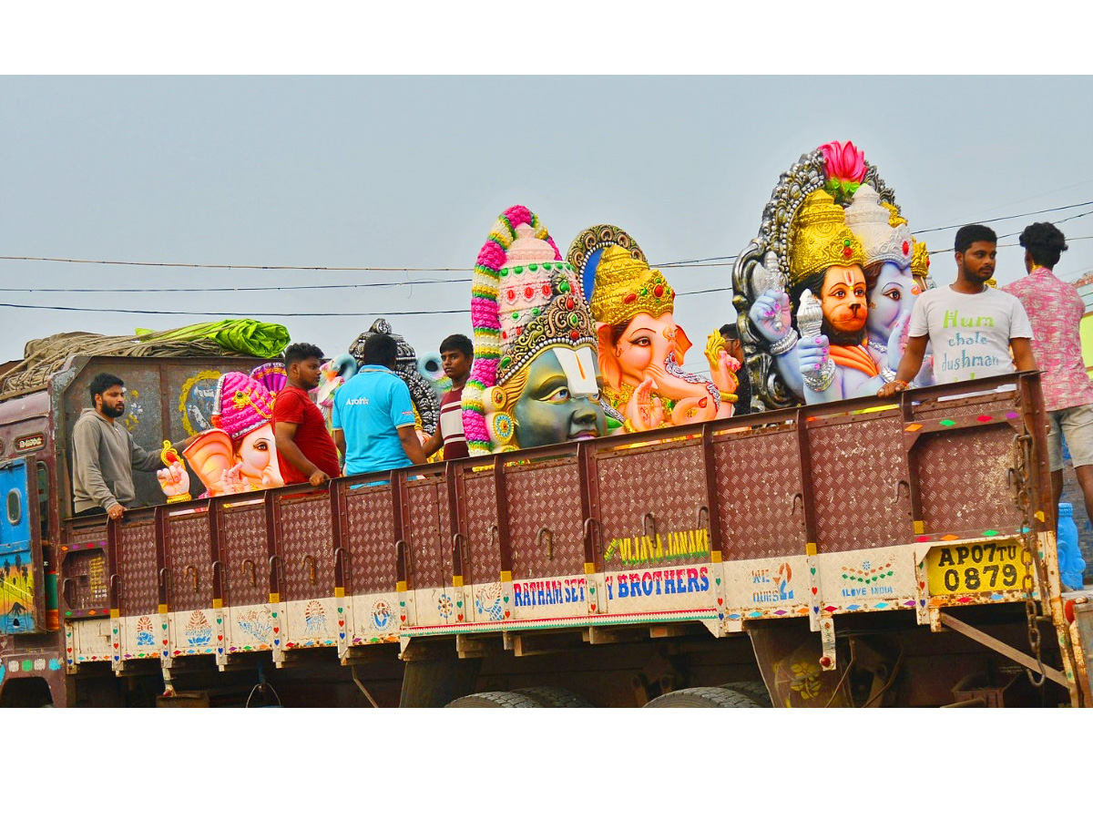 People carry idols of Ganesha on a truck ahead of Ganesh Chaturti festival Photo Gallery - Sakshi16