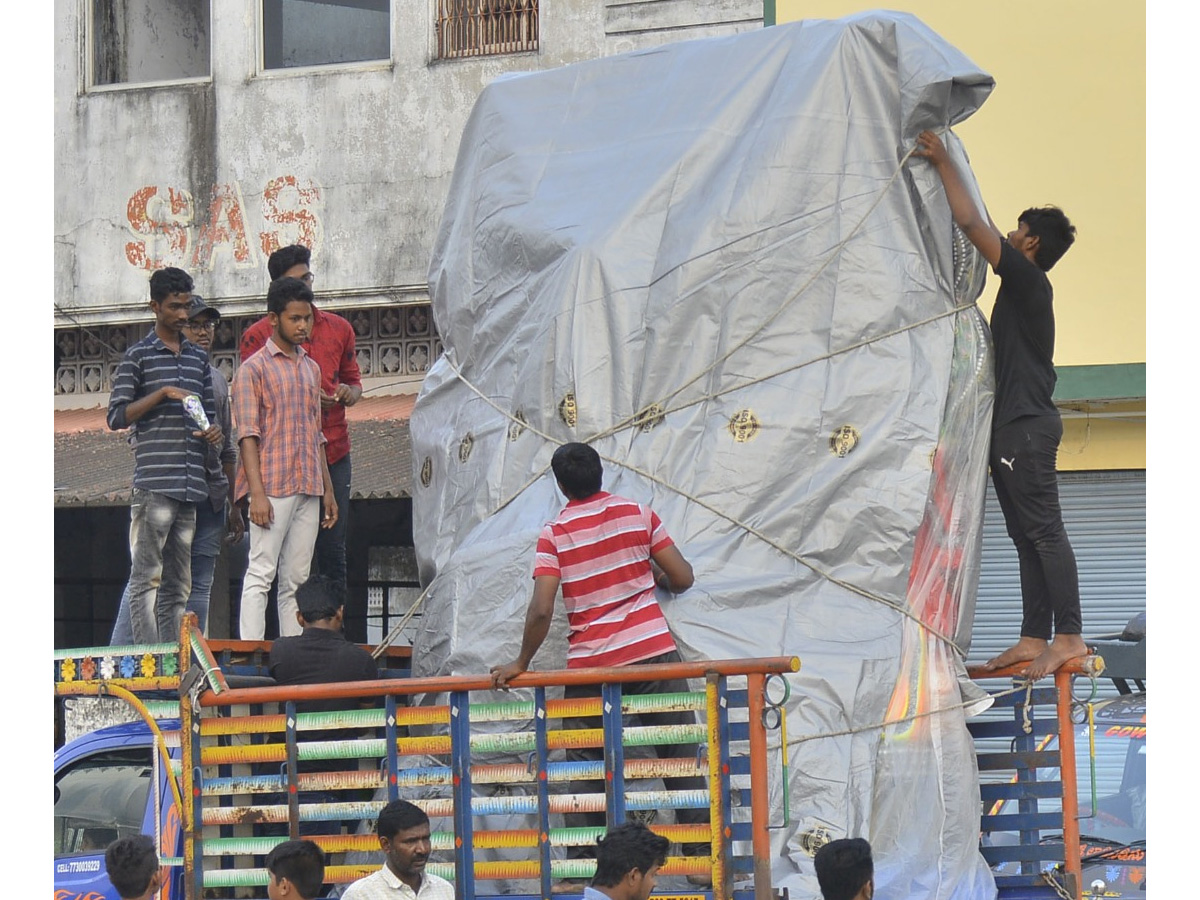 People carry idols of Ganesha on a truck ahead of Ganesh Chaturti festival Photo Gallery - Sakshi10