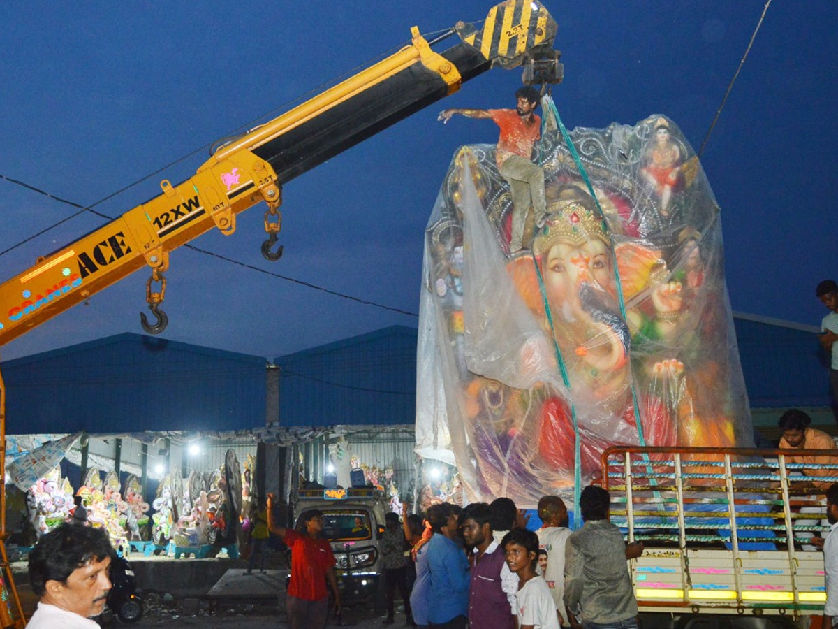 People carry idols of Ganesha on a truck ahead of Ganesh Chaturti festival Photo Gallery - Sakshi12