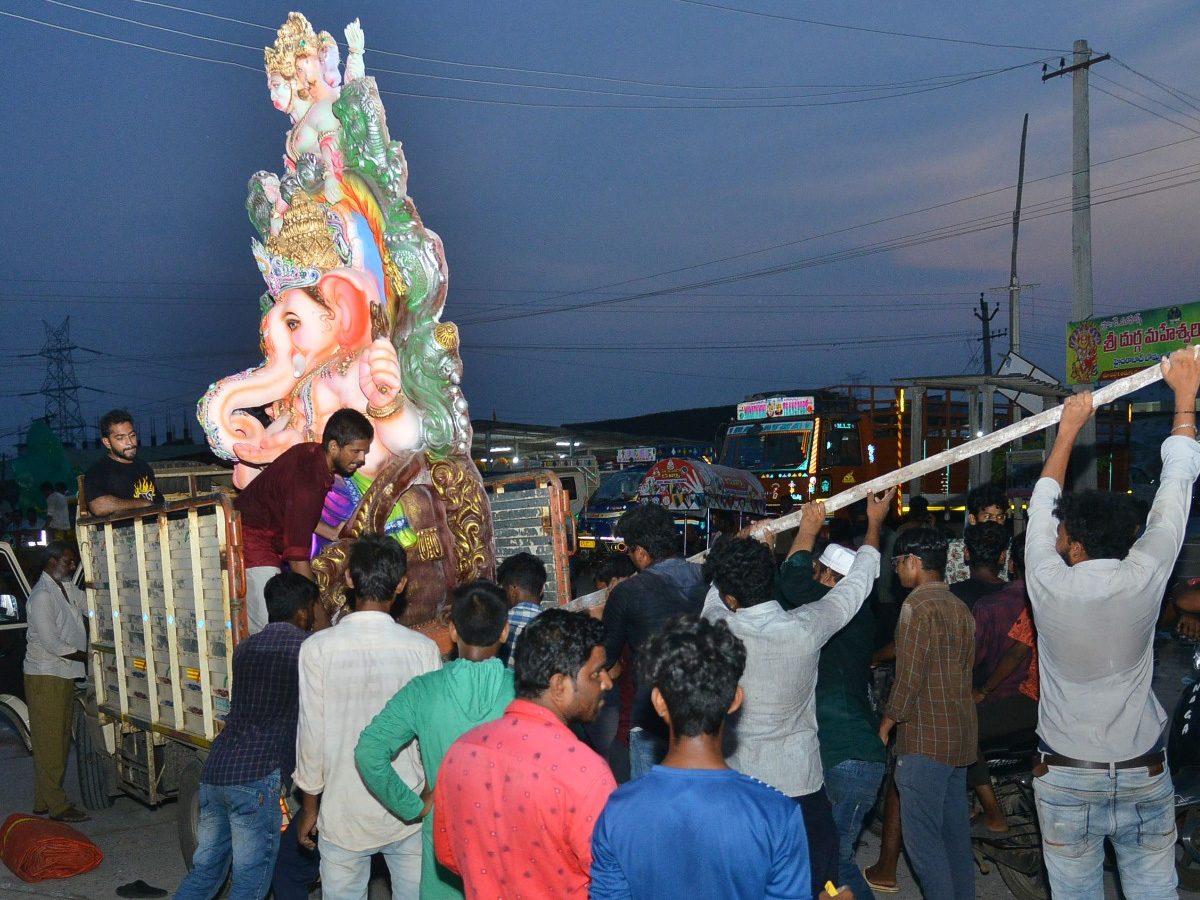 People carry idols of Ganesha on a truck ahead of Ganesh Chaturti festival Photo Gallery - Sakshi13