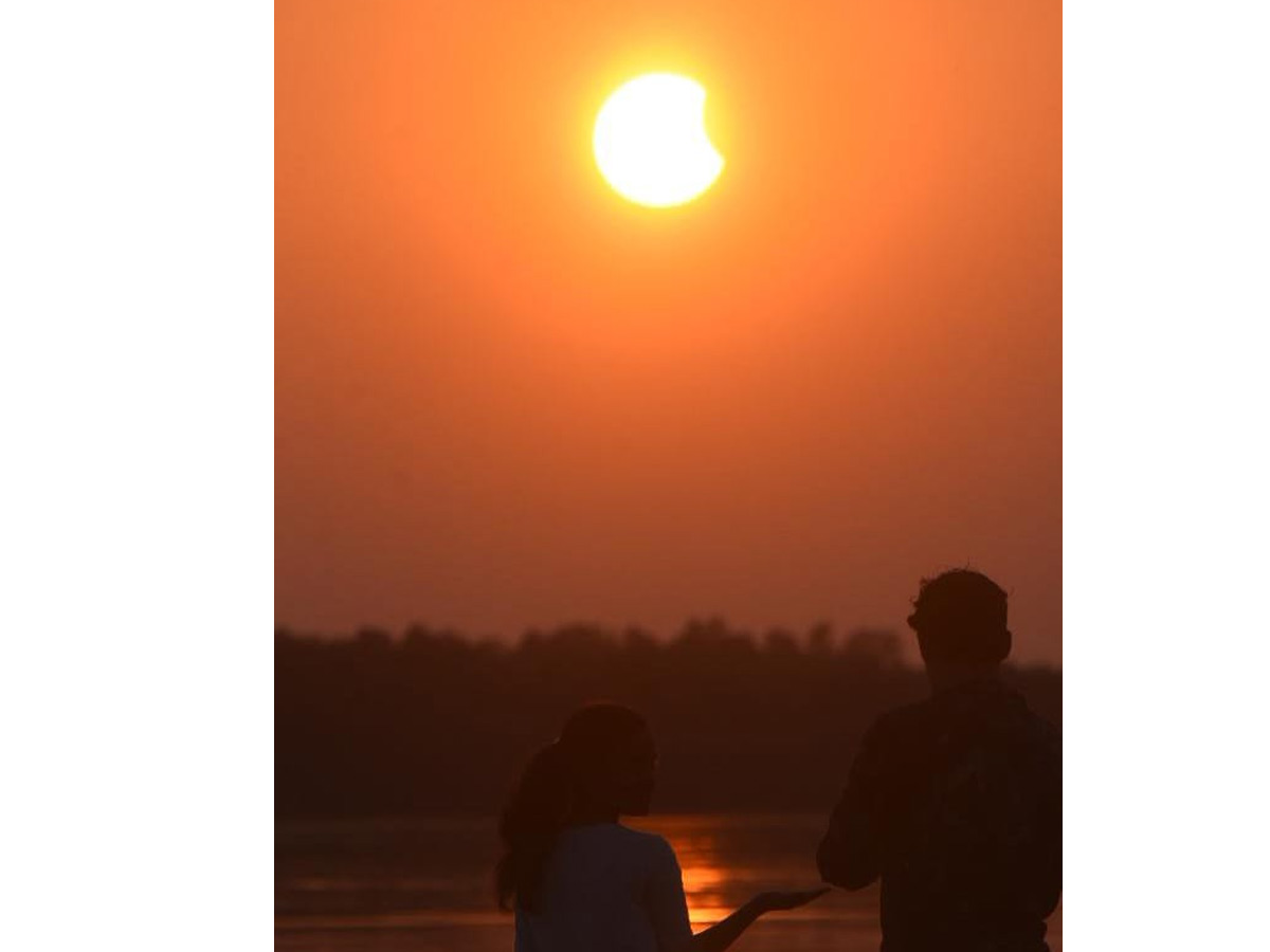 People observing solar eclipse Photo Gallery - Sakshi10