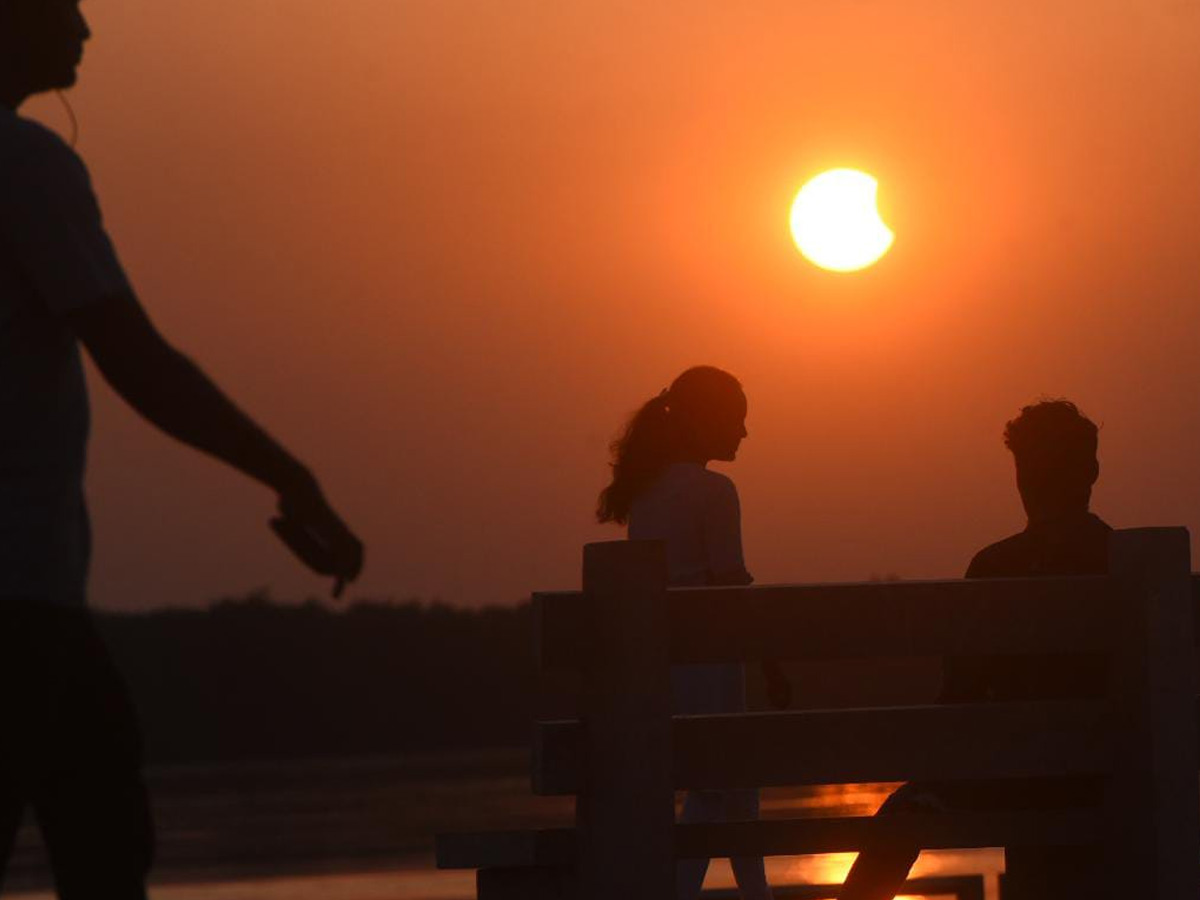 People observing solar eclipse Photo Gallery - Sakshi7