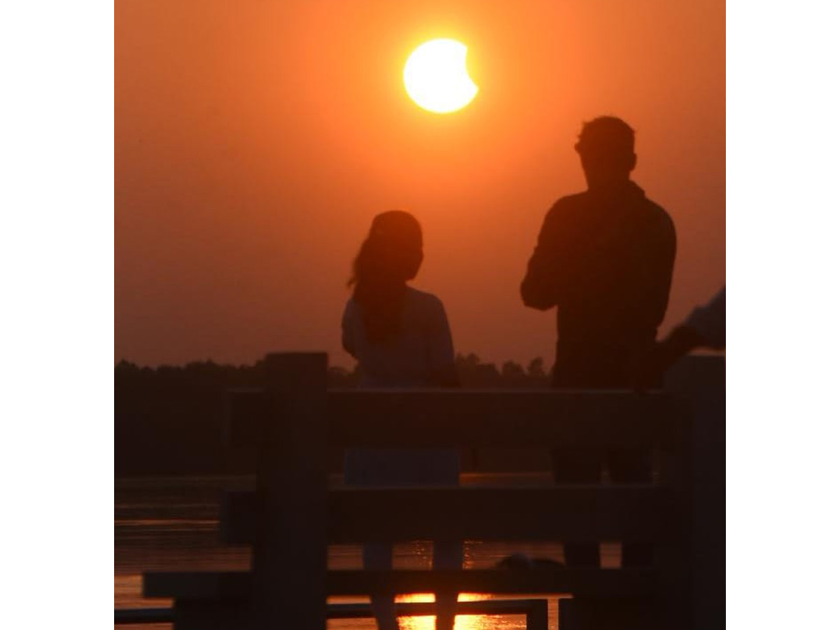 People observing solar eclipse Photo Gallery - Sakshi9