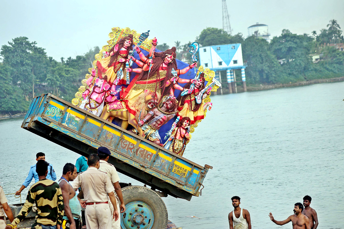 Devi Durga Being Immersed In Ganga River - Sakshi29