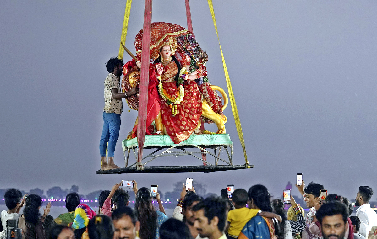 Devi Durga Being Immersed In Ganga River - Sakshi34