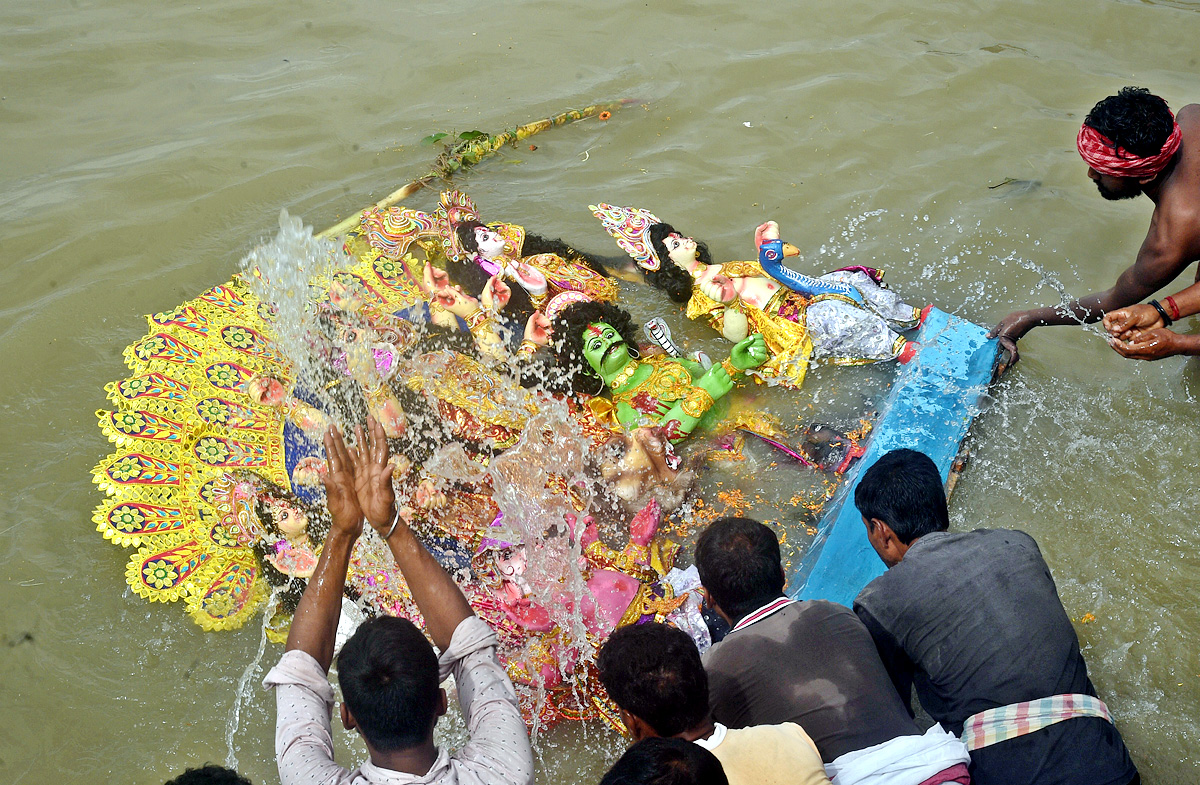 Devi Durga Being Immersed In Ganga River - Sakshi36