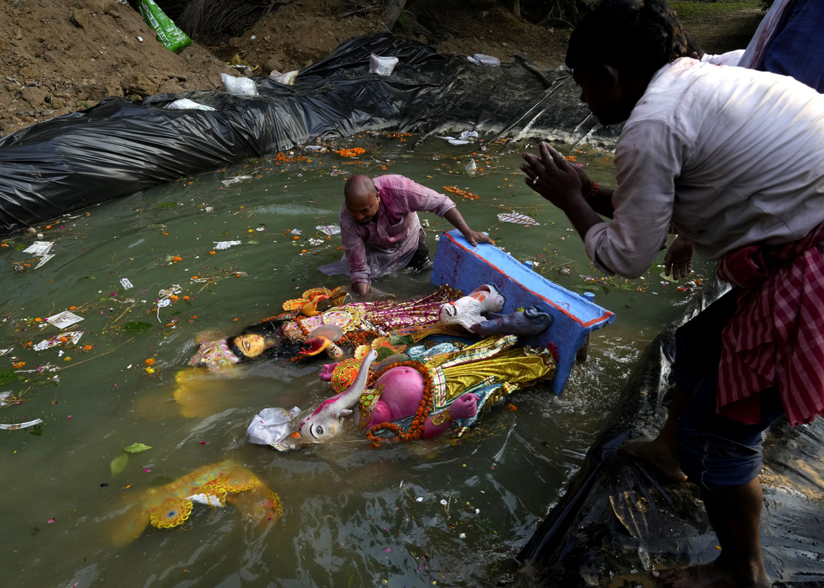 Devi Durga Being Immersed In Ganga River - Sakshi37