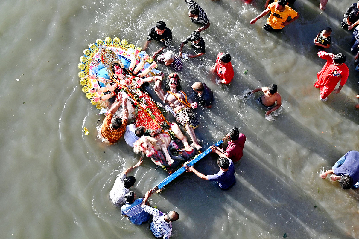 Devi Durga Being Immersed In Ganga River - Sakshi3