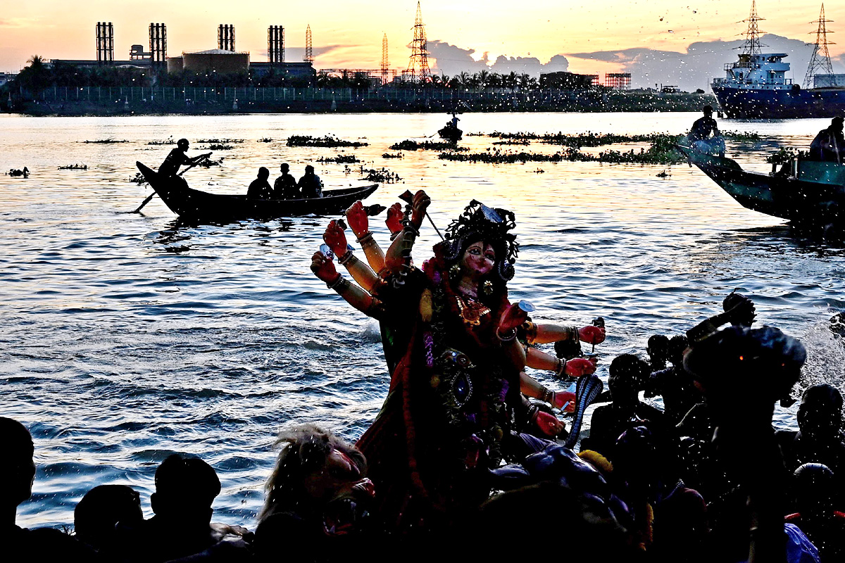 Devi Durga Being Immersed In Ganga River - Sakshi4