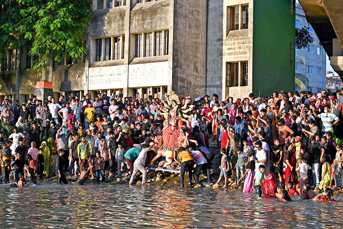 Devi Durga Being Immersed In Ganga River - Sakshi5