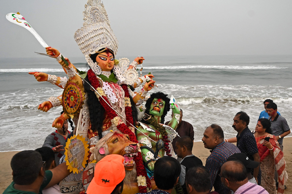 Devi Durga Being Immersed In Ganga River - Sakshi9