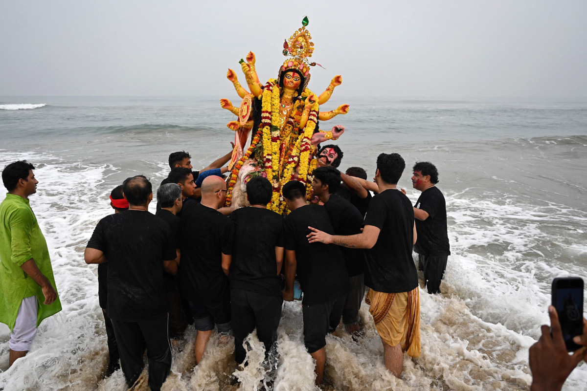 Devi Durga Being Immersed In Ganga River - Sakshi10