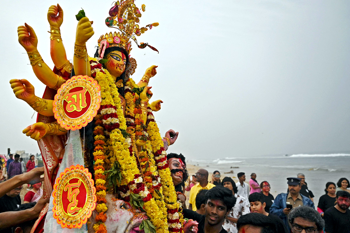 Devi Durga Being Immersed In Ganga River - Sakshi11