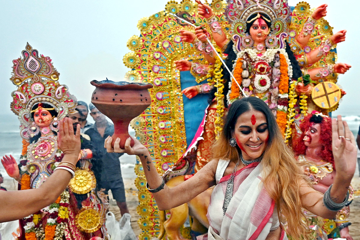 Devi Durga Being Immersed In Ganga River - Sakshi1