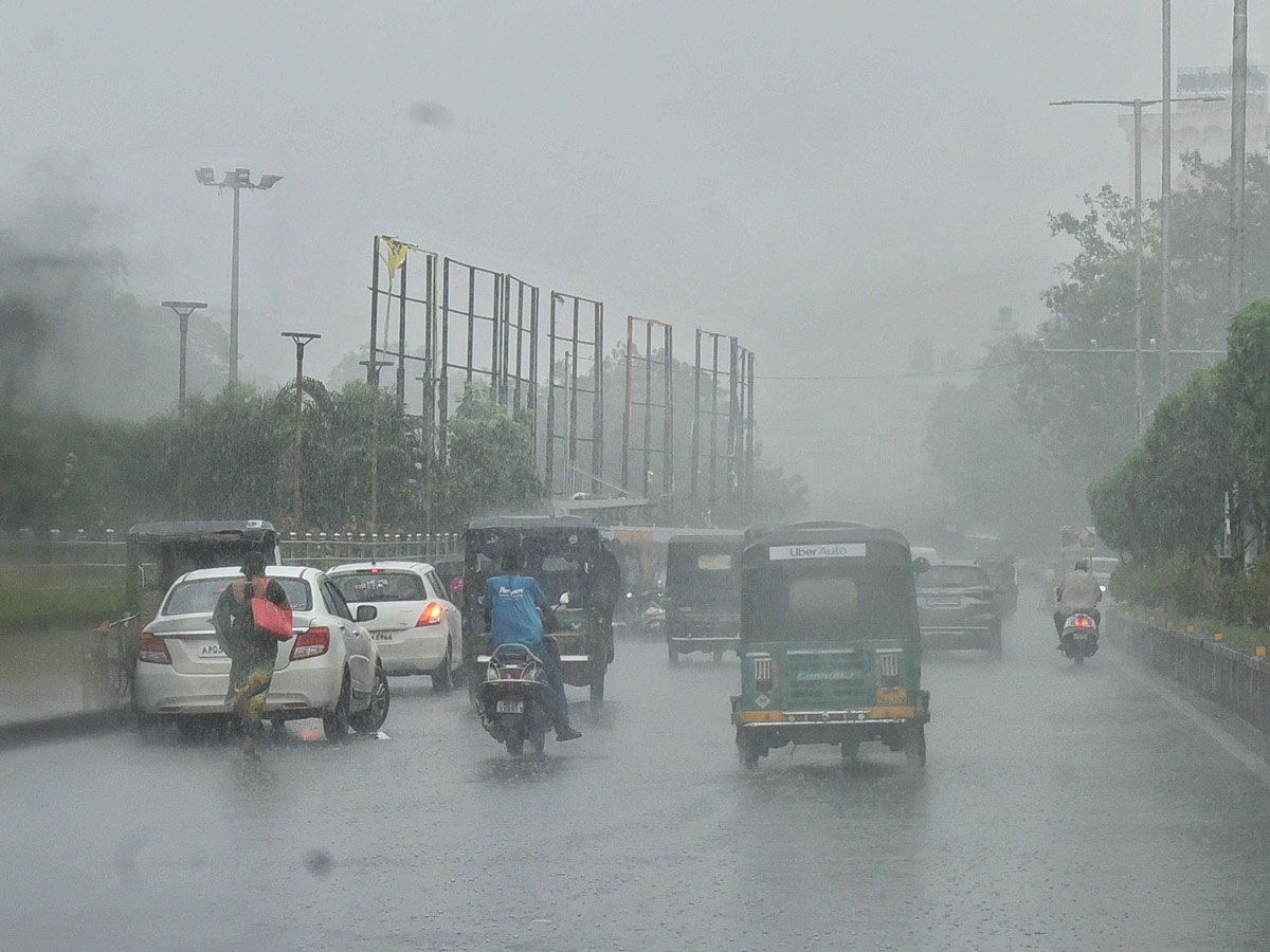 Heavy rains and thunderstorm in both Telugu states  - Sakshi12