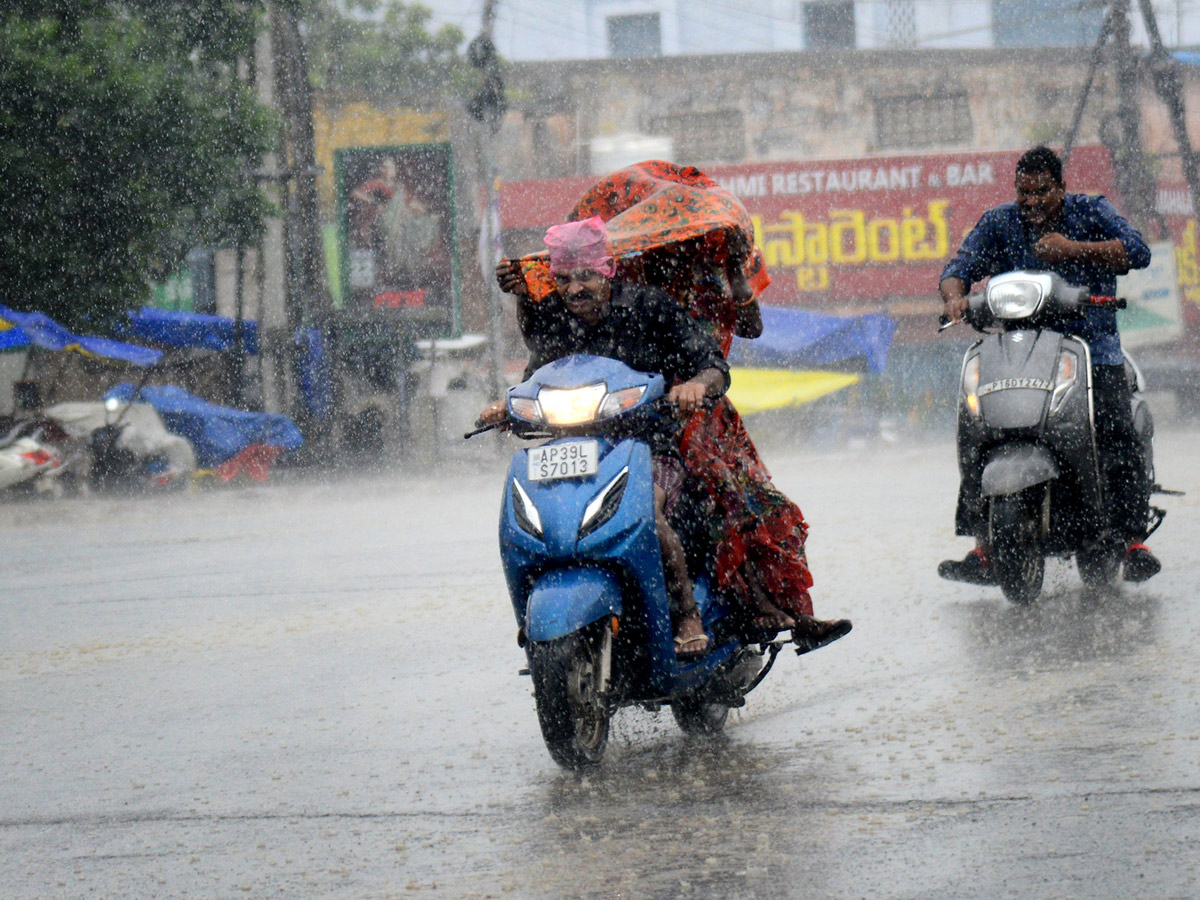 Heavy rains and thunderstorm in both Telugu states  - Sakshi35