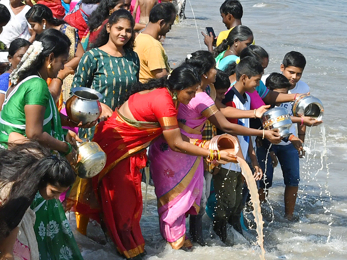 Photos: People Worship To Gangamma At Peda Jalaripeta Beach - Sakshi2