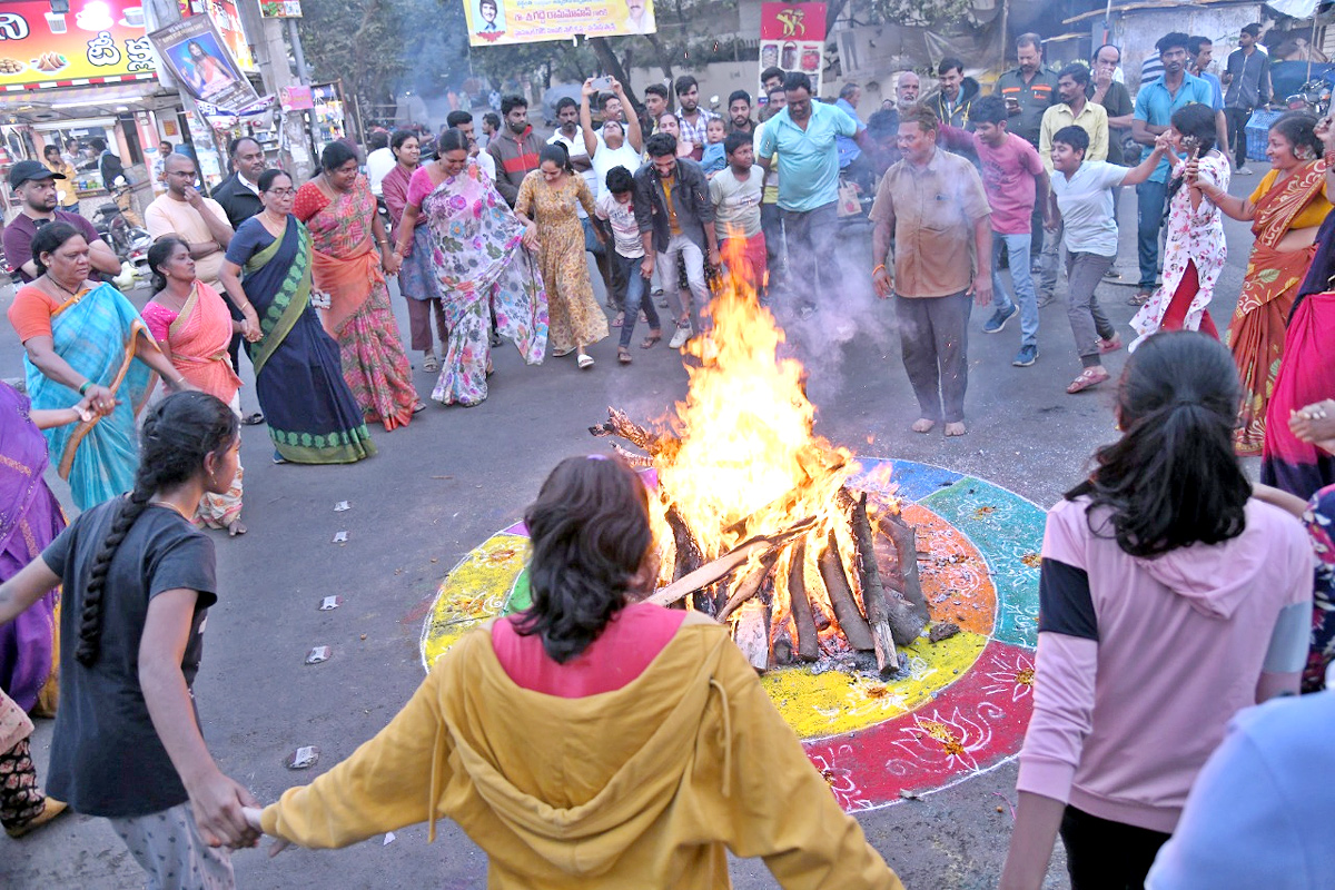 Bhogi Festival Celebrations In Vijayawada - Sakshi2