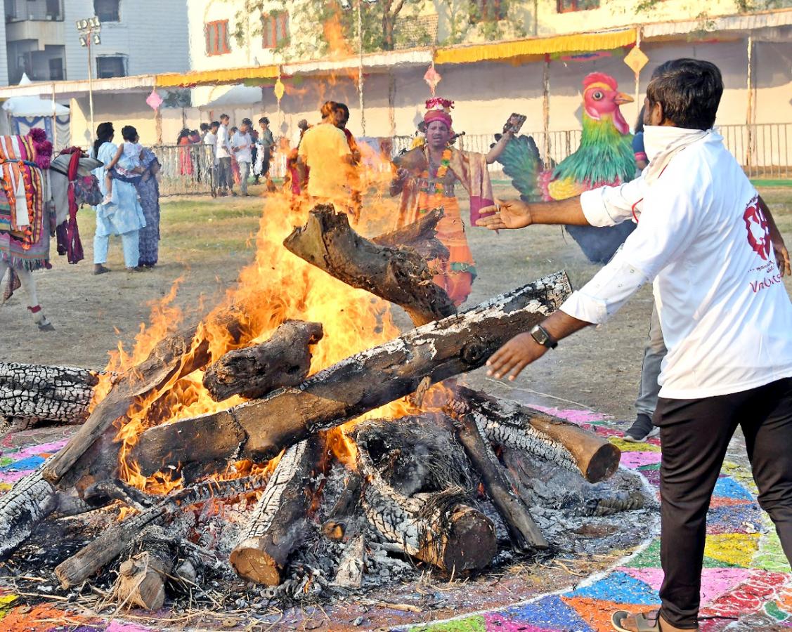 Bhogi Festival Celebrations In Vijayawada - Sakshi9