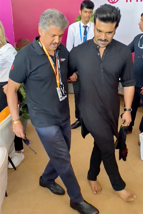 Ram Charan Teaches Natu Natu Step To Anand Mahindra At Formula E Racing Photos - Sakshi10