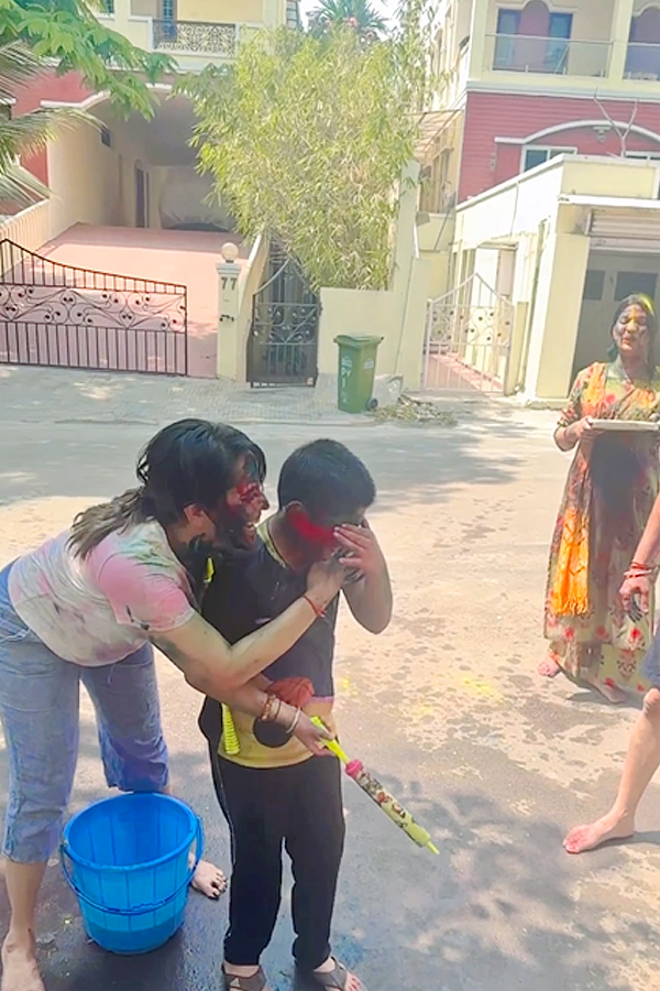 Anchor Anasuya Holi Celebrations With Her Family Photos - Sakshi12