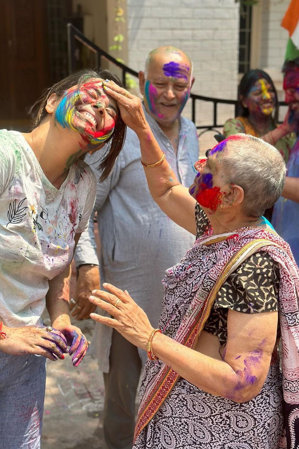 Anchor Anasuya Holi Celebrations With Her Family Photos - Sakshi5