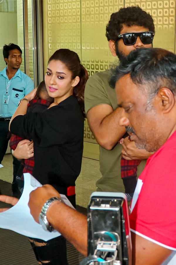 Nayanthara and Vignesh Shivan with their children at the airport Photos - Sakshi2