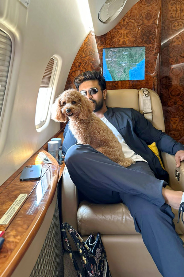 Ram Charan Moments With His Pet Dog Photos - Sakshi5