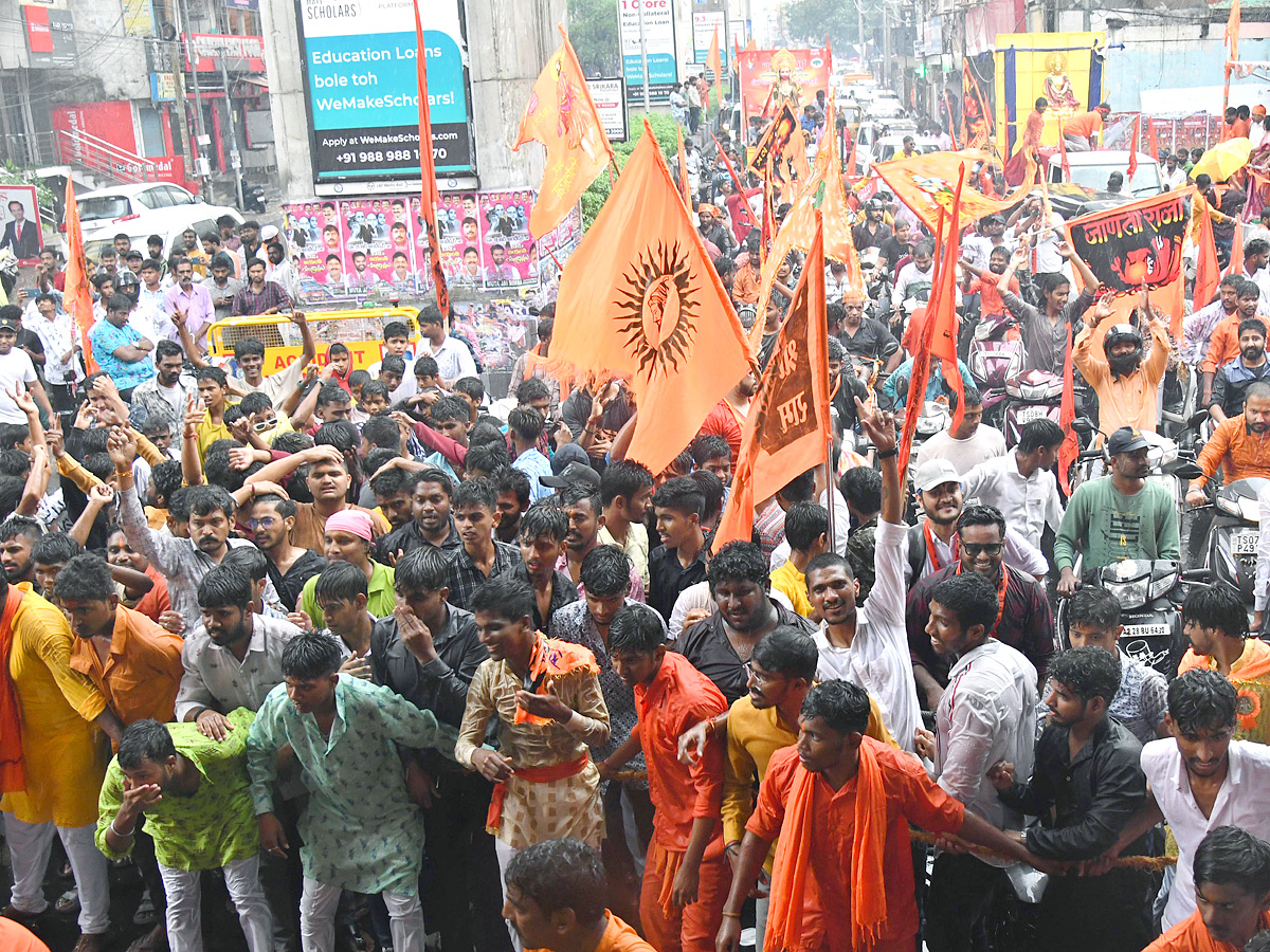 Heavy Rain at Hanuman Jayanti Shobha Yatra 2023 in Hyderabad Photos - Sakshi11