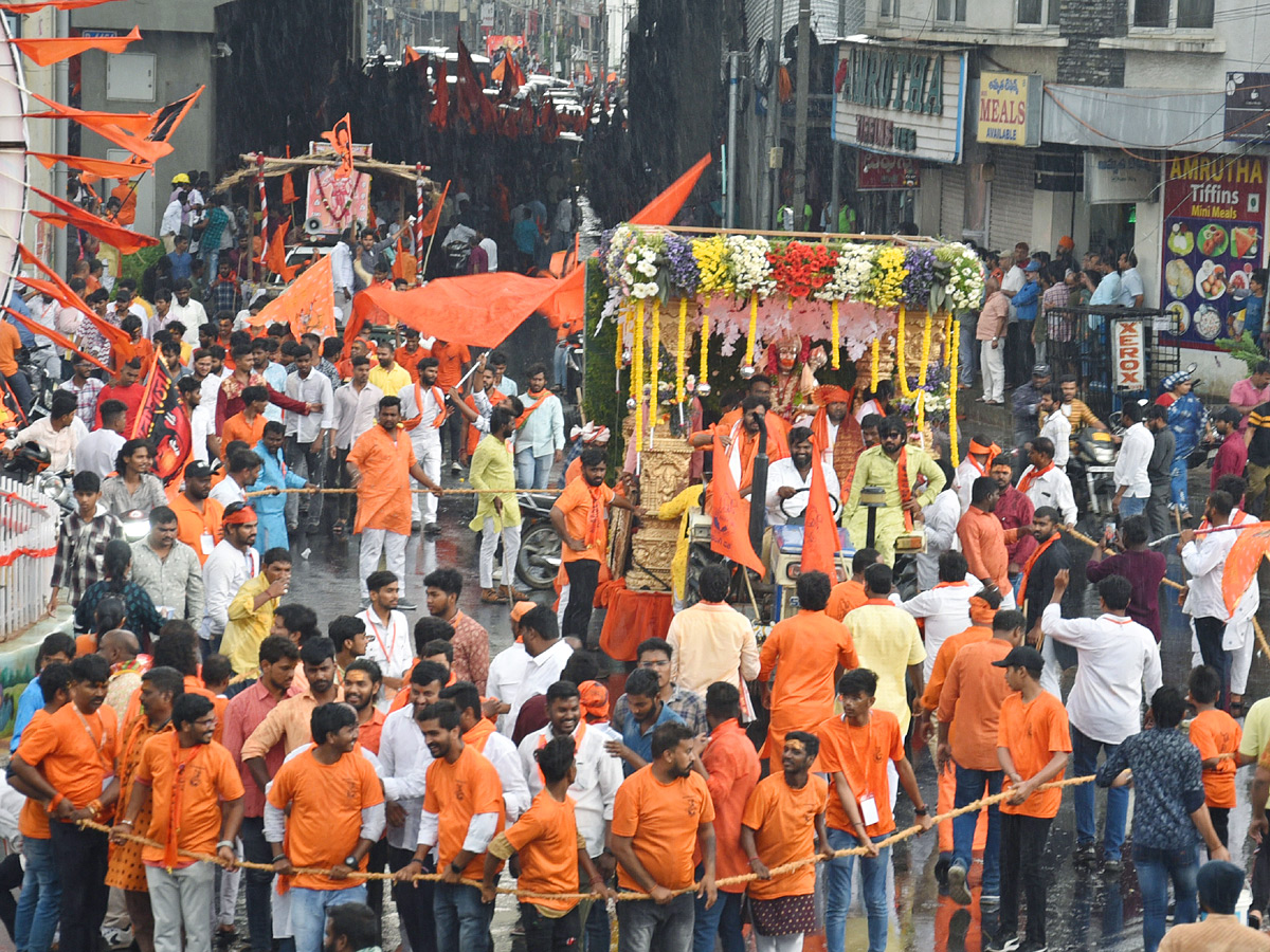 Heavy Rain at Hanuman Jayanti Shobha Yatra 2023 in Hyderabad Photos - Sakshi15