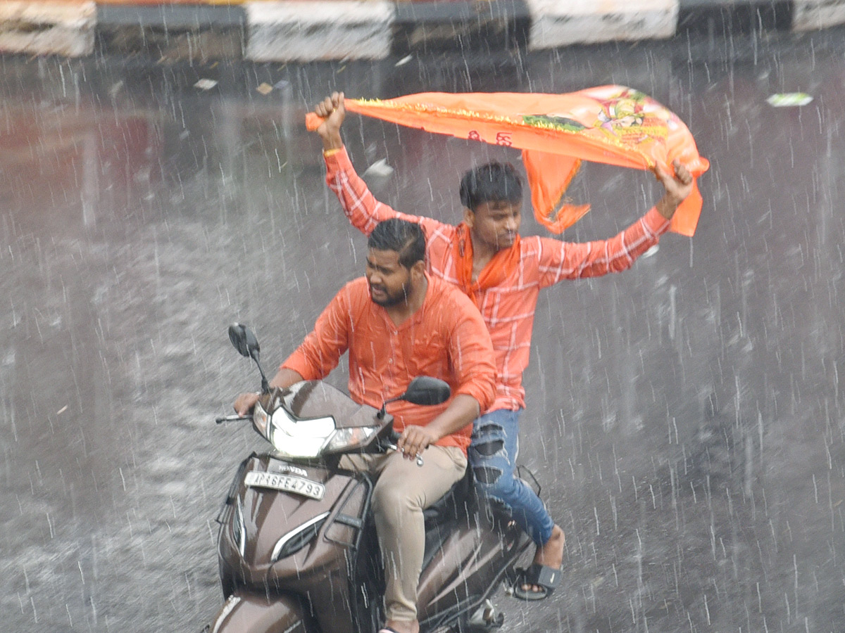 Heavy Rain at Hanuman Jayanti Shobha Yatra 2023 in Hyderabad Photos - Sakshi17