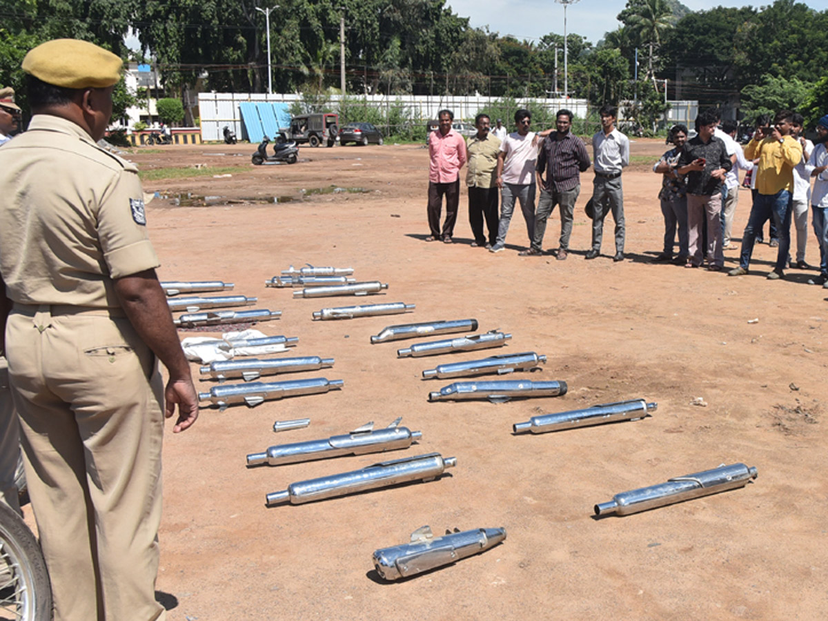 Police Crushing Bike Silencers Using Road Roller - Sakshi8