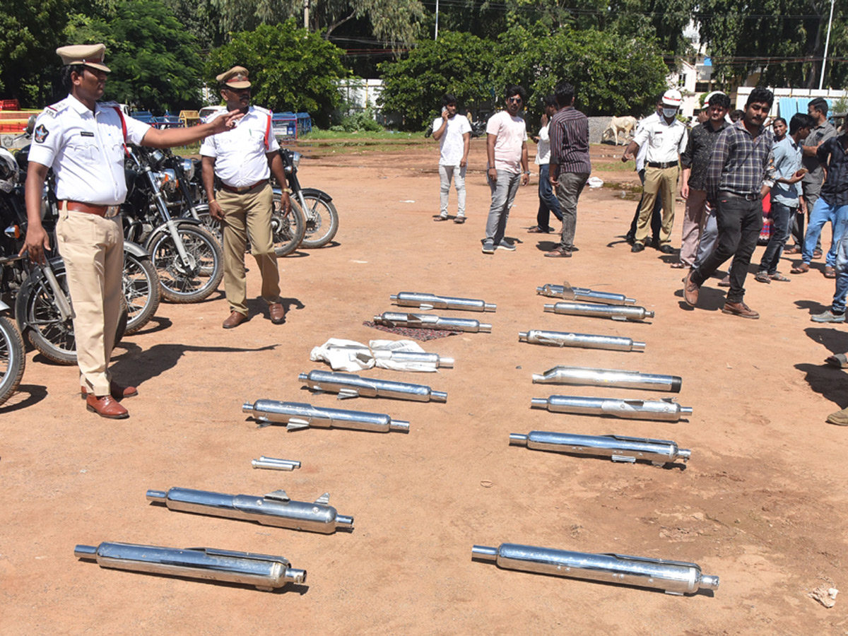 Police Crushing Bike Silencers Using Road Roller - Sakshi11