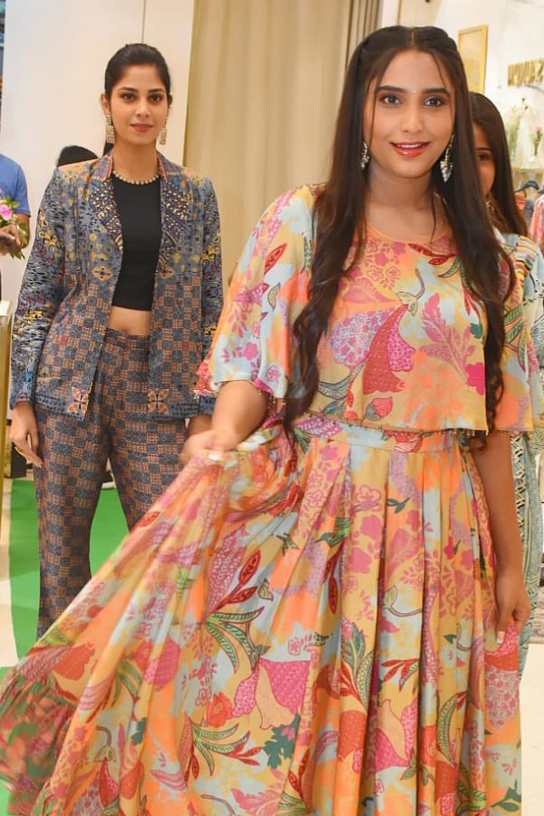 Models opening cloth store Photos - Sakshi11