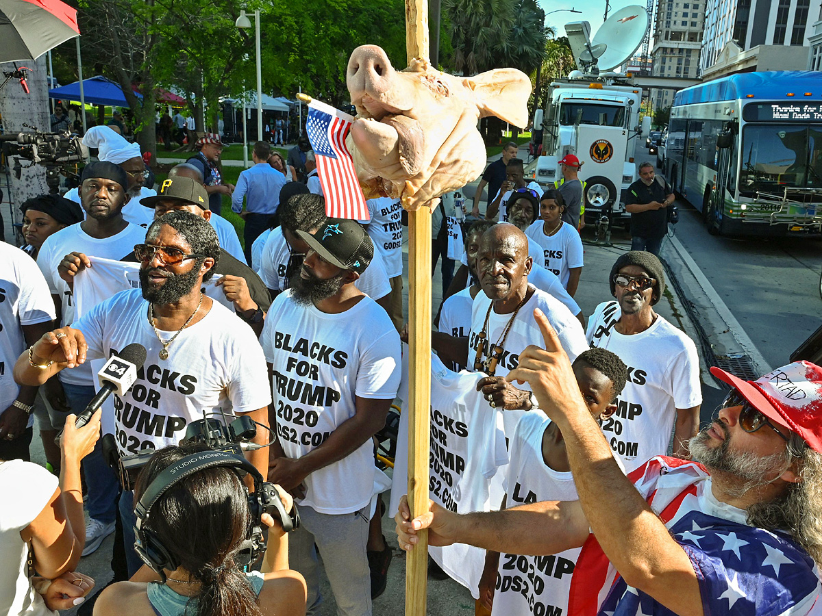 Miami braces for protests as Trump arrives Photos - Sakshi5