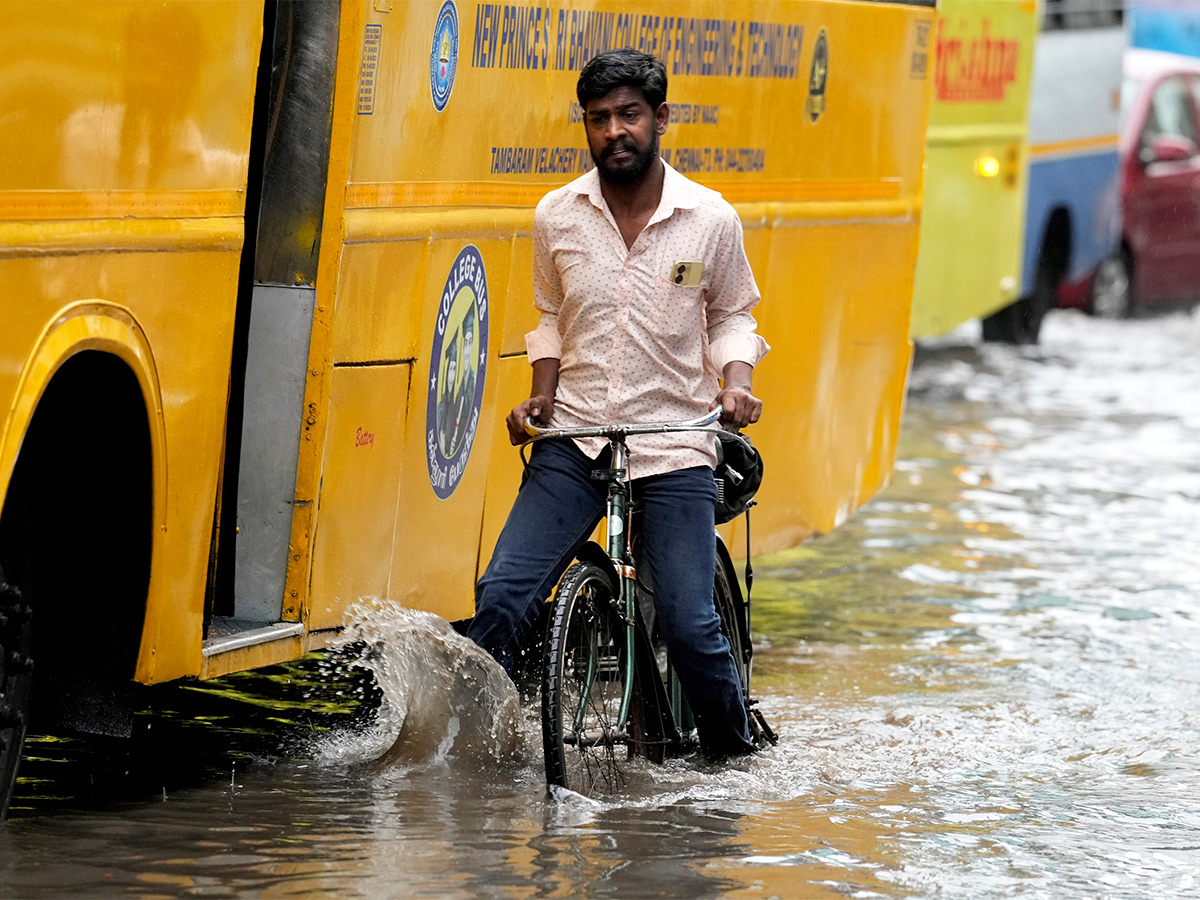 Tamil Nadu rains: Heavy rains lash Chennai its suburbs Photos - Sakshi14