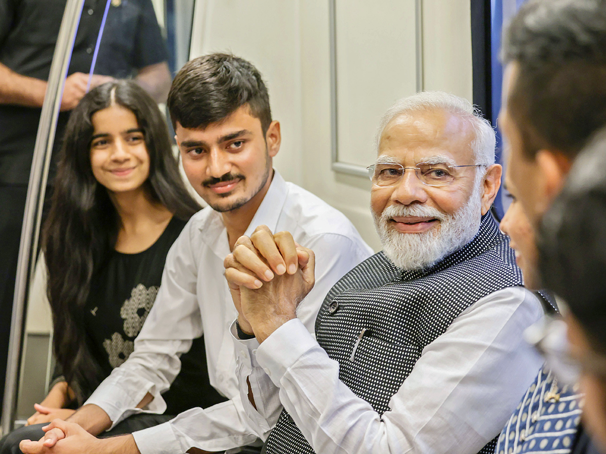 PM Narendra modi travels in metro to attend Delhi University event PHotos - Sakshi2