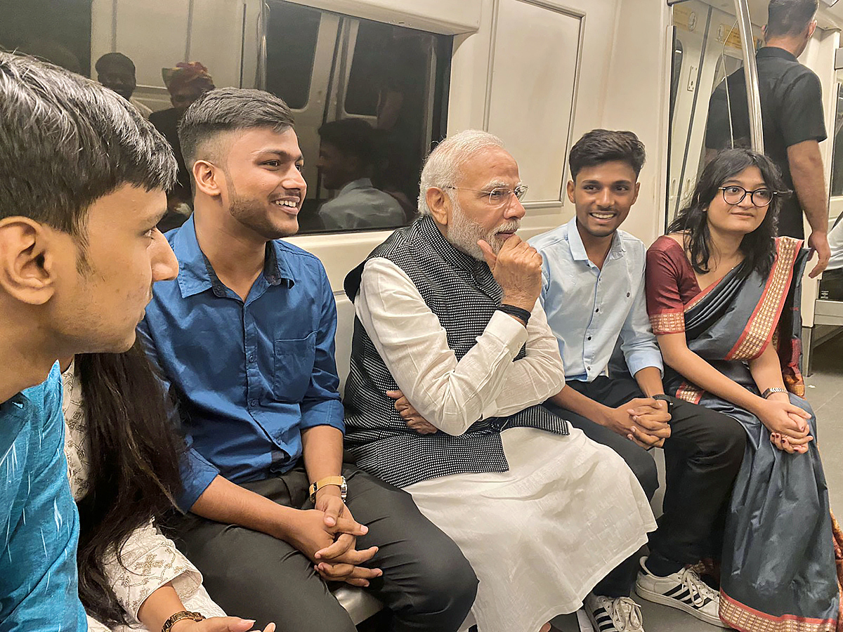 PM Narendra modi travels in metro to attend Delhi University event PHotos - Sakshi19