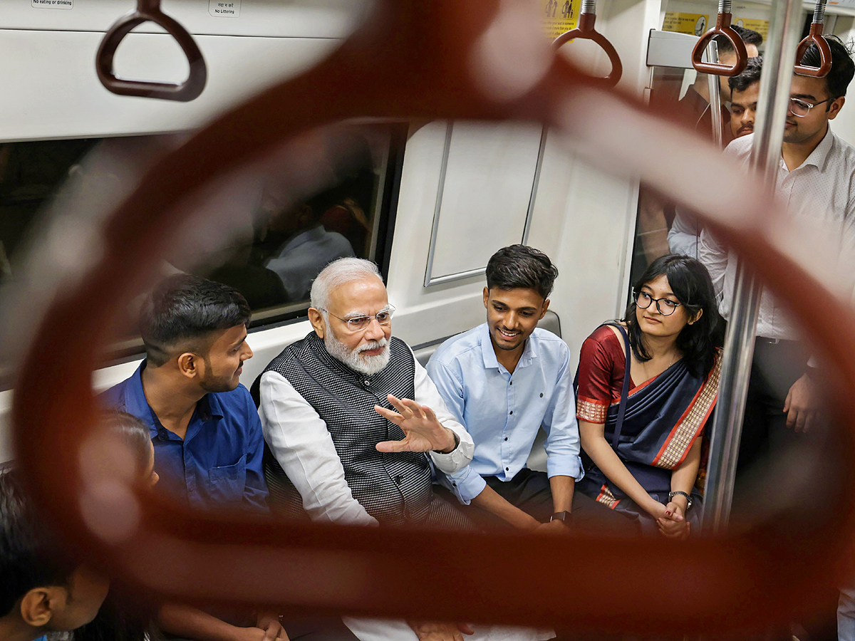 PM Narendra modi travels in metro to attend Delhi University event PHotos - Sakshi8