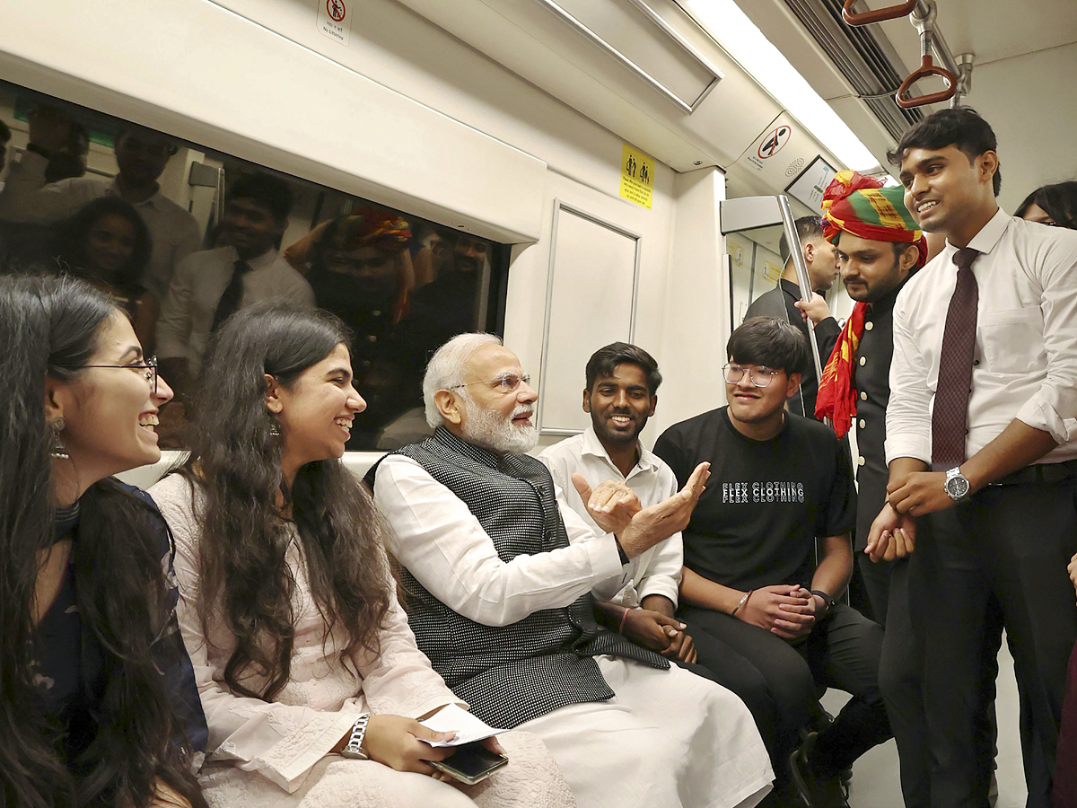 PM Narendra modi travels in metro to attend Delhi University event PHotos - Sakshi10