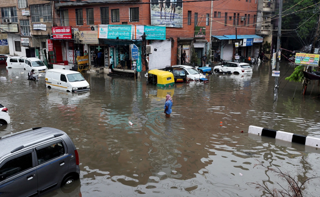 Heavy Rainfall Lashes Northern India Photo Gallery - Sakshi4